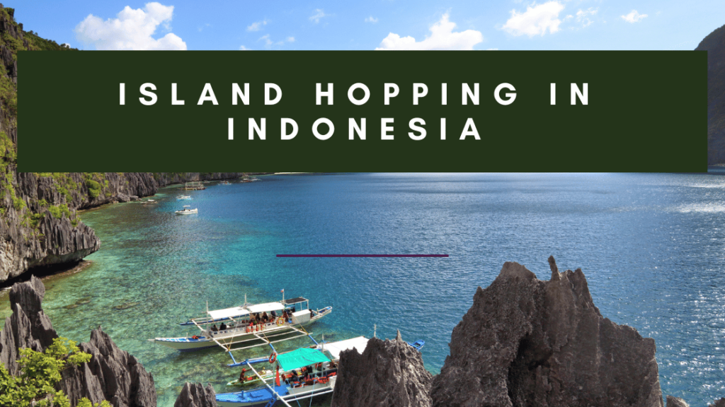 Several boats are anchored in a bay with turquoise water, surrounded by limestone cliffs. The sky is blue with white clouds. Text overlay reads: "Island Hopping in Indonesia.